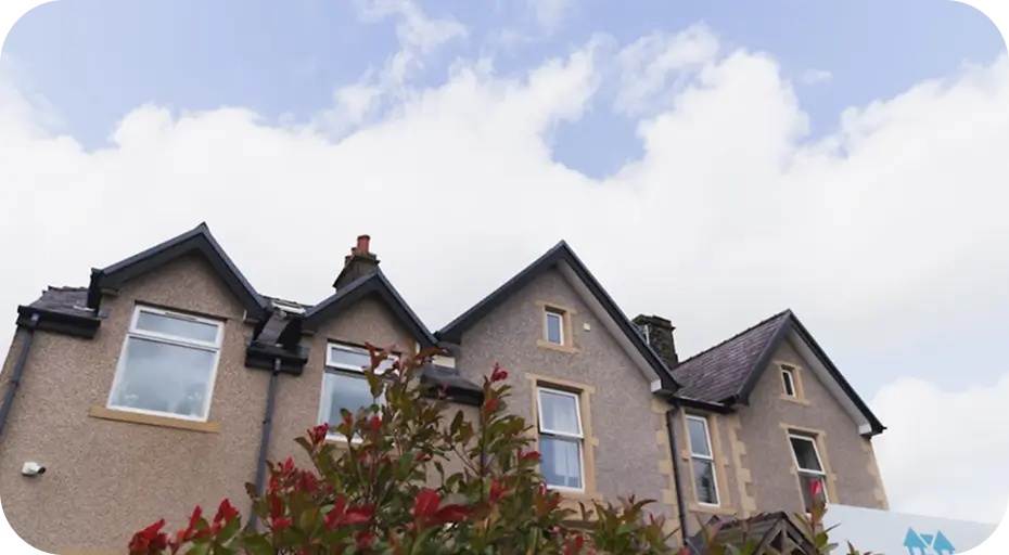 Exterior of a welcoming two-storey care home building in Clitheroe