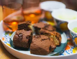 Plate of chocolate brownies on tray at High Brake House care home, Lancashire